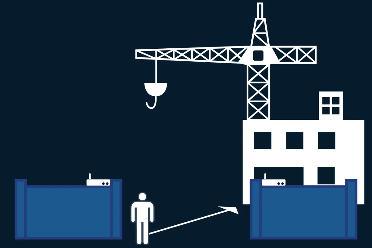 Illustration of a construction site with a crane, a building, and a worker walking between two containers fitted with receivers